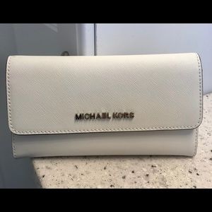 Authentic Michael Kors jet set travel wallet